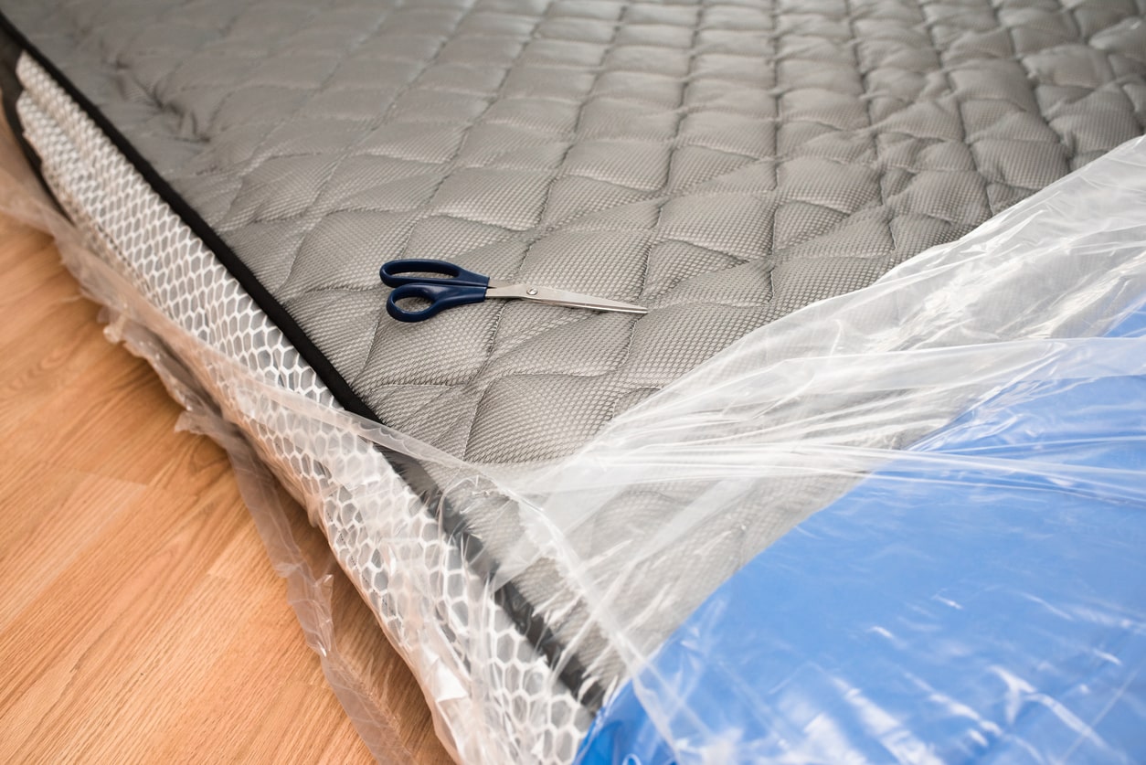 Should you take the plastic off a new mattress? - Slumber And Smile