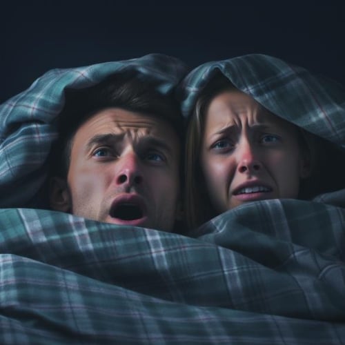 Couple suffering the effects of poor sleep on health and relationships.