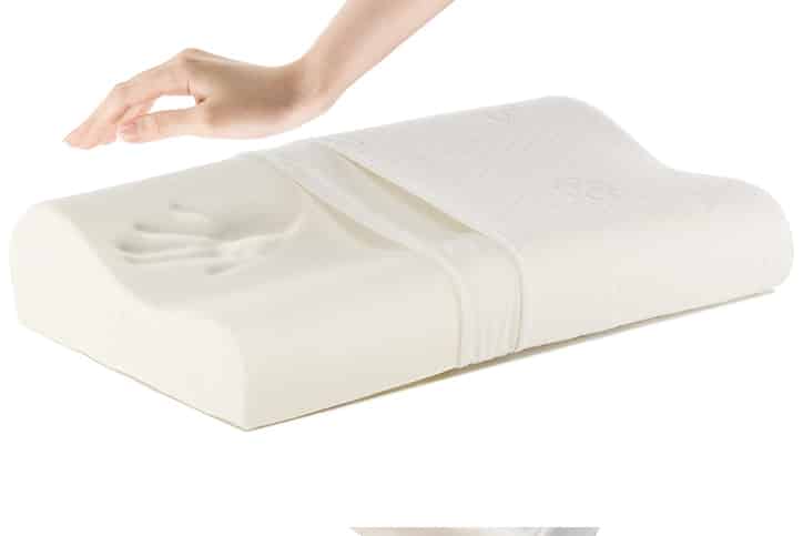 Orthopedic Pillow with a Memory Effect. Medical treatment pillow for sleep. Comfort Memory Pillow under the head with a recess under the shoulder isolated on white background. Sleeping Support Pillow